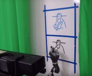 This robot learns to draw and write from photos